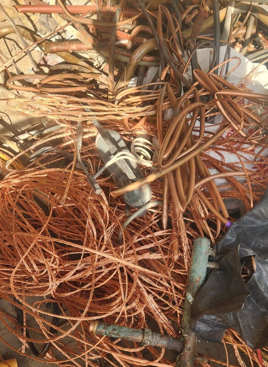 Copper wire and copper pipe scrap sorted in a pile