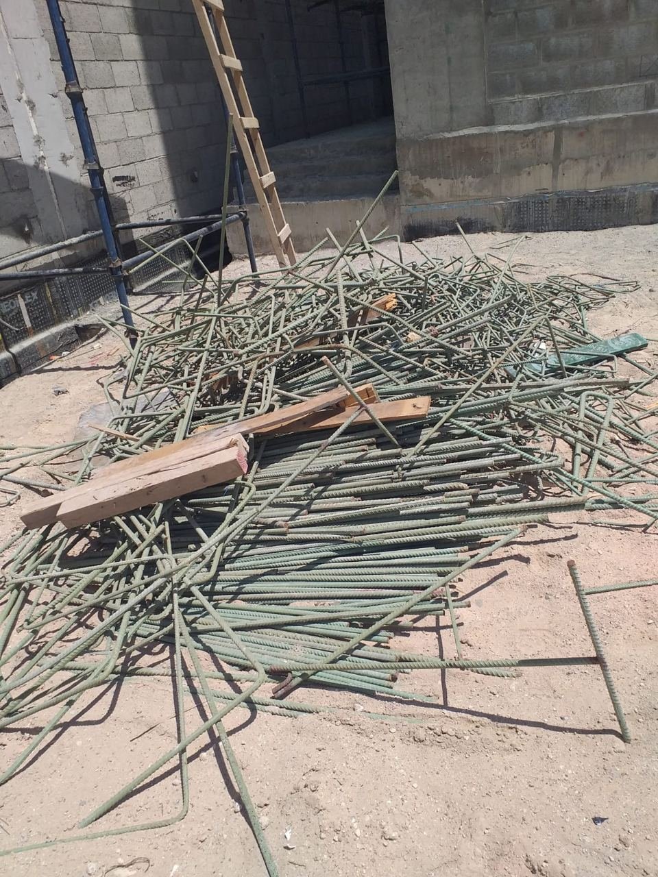 Pile of cut reinforcement bars left over at a construction site